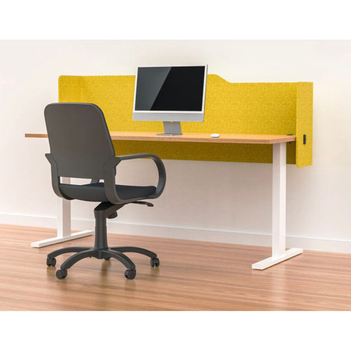 Yellow acoustic desk screen in milford style, mounted to the back of a desk.  Sits above and below the desk and wraps around the sides for additional privacy