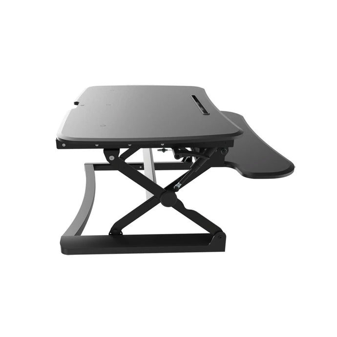 A black desk top raiser to convert a standard desk to a standing desk NZ