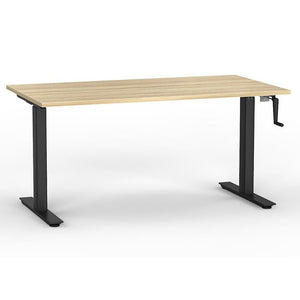 Oak look desk with manual winder for user adjusted Sit Stand Desk